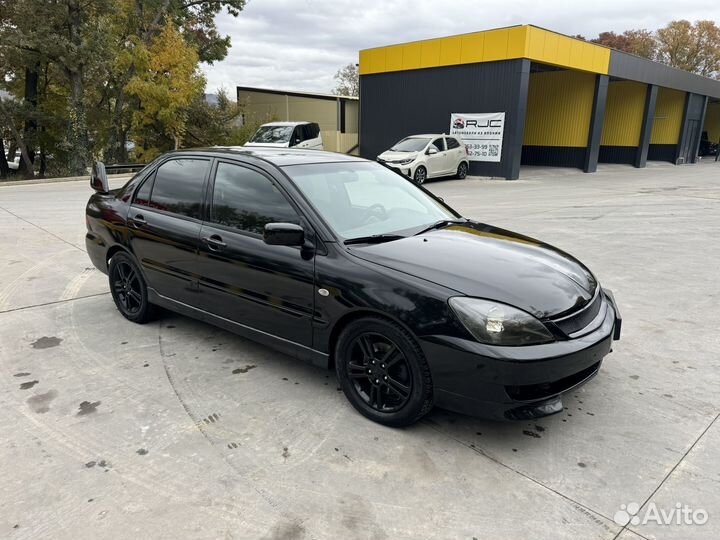 Mitsubishi Lancer 2.0 МТ, 2005, 264 500 км