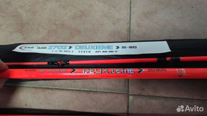 Два спиннинга и катушка