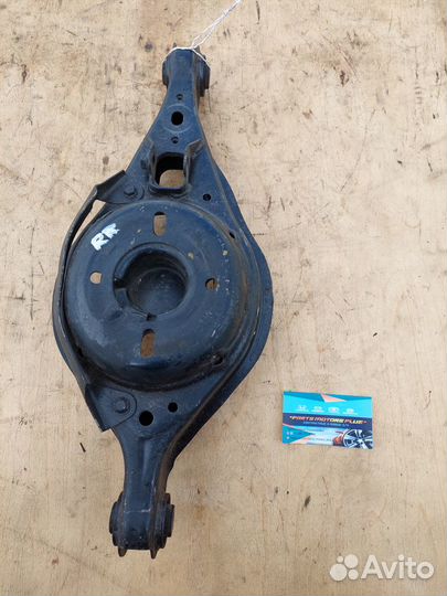 Задний правый подпружинный рычаг Мазда 6 GG