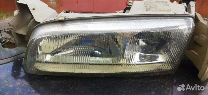 Фара левая Mazda 626 Ge