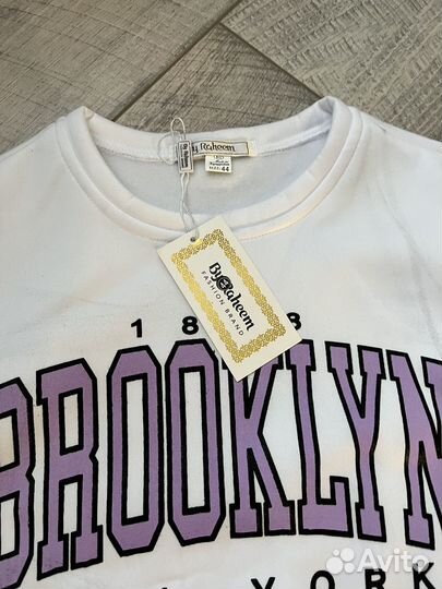 Новый женский спортивный костюм 44