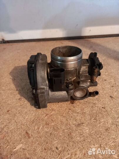 Дроссельная заслонка Гольф 4 Ауди А3 06A133064M