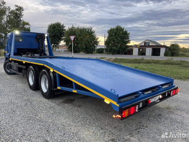 Эвакуаторная платформа ломанного типа сдокументами