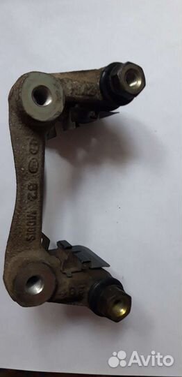 Скоба заднего суппорта Hyundai Solaris 1,2, Rio3,4