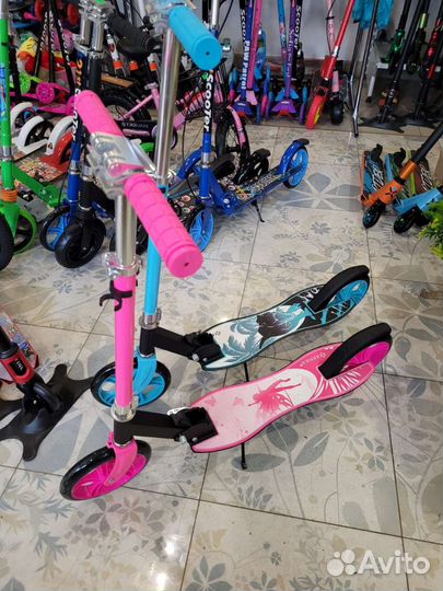 Новые подростковые самокаты с фигурной платформой