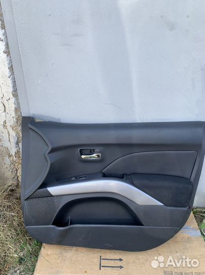 Обшивка двери Outlander xl 2011