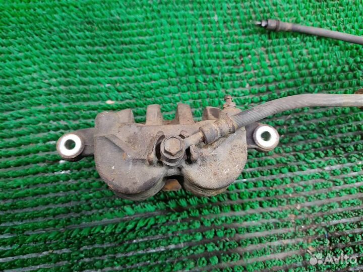 Суппорт тормозной передний левый Subaru Legacy/ O