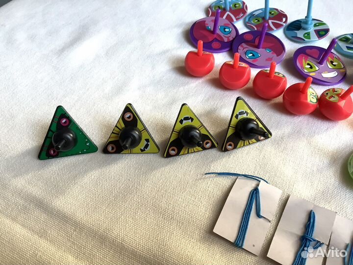 Игрушки коллекционные волчки О'кей