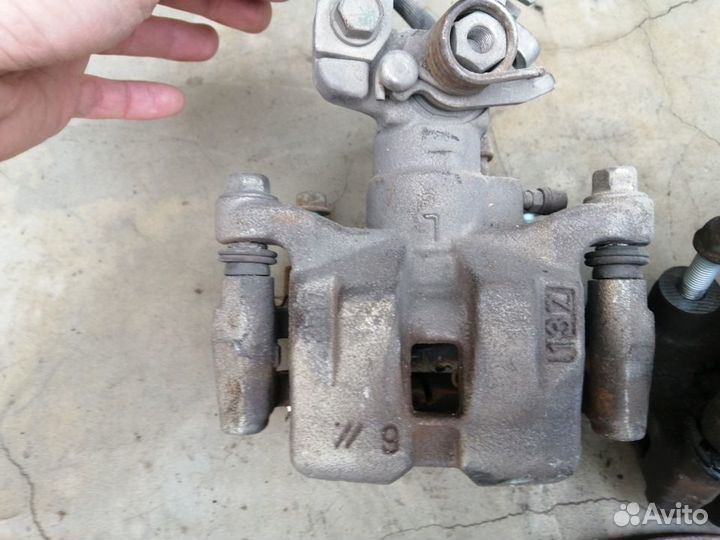 Суппорт левый Mazda 6 gg / gh