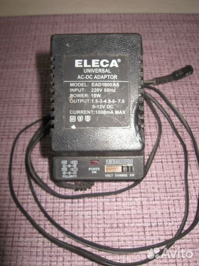 Блок питания eleka universal AC-DC adaptor 1,5-12V