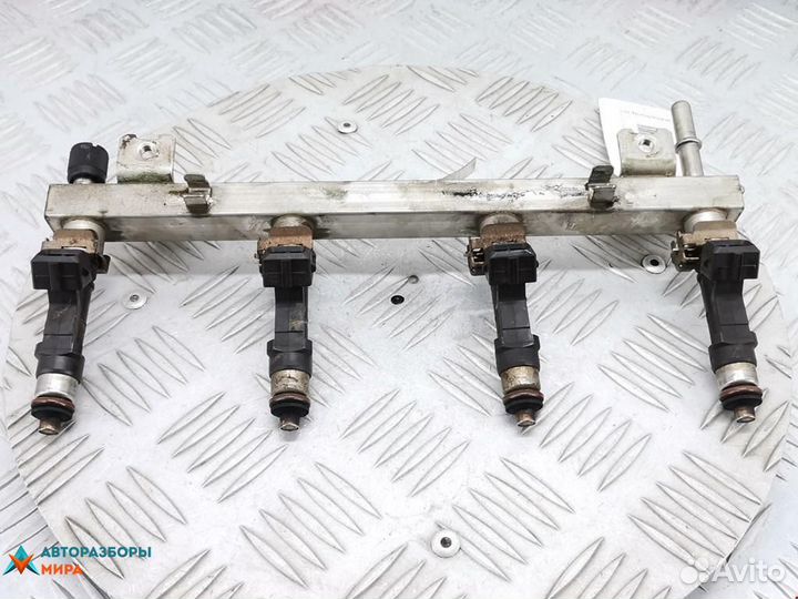 Форсунка Opel Corsa D 2007 55562250