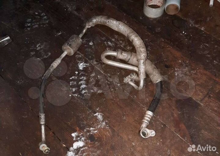 Трубка кондиционера Kia Carens рест. 2006