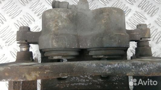 Суппорт тормозной передний левый KIA sorento 1 (1B