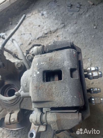 Суппорт передний киа спектра