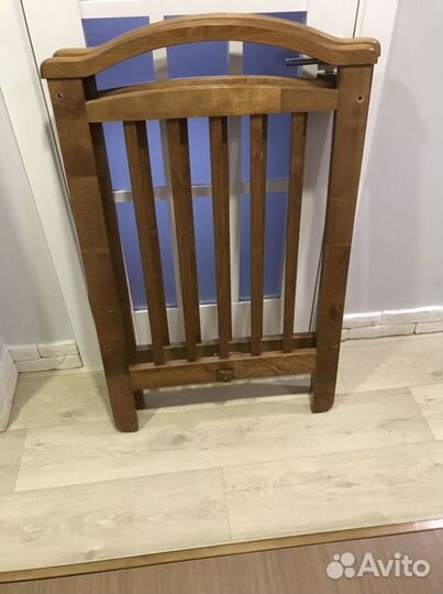 Детская маятниковая кроватка