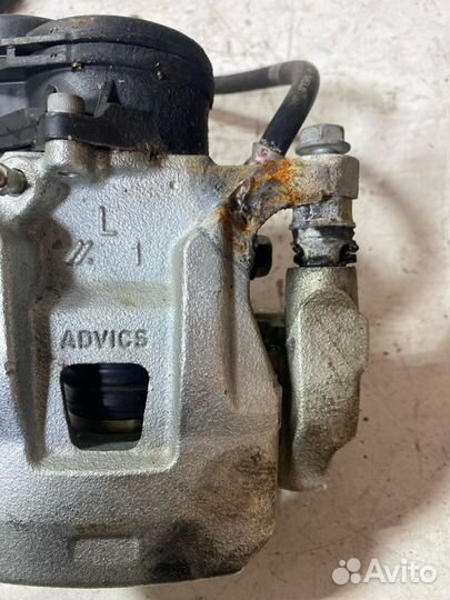 Суппорт тормозной задний левый Mitsubishi