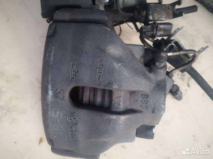 Суппорт тормозной передний passat Б5,Б5+