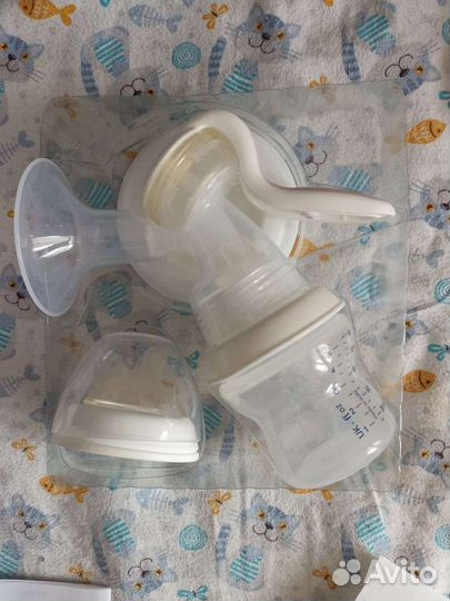 Новый молокоотсос ручной