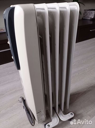 Масляный обогреватель delonghi