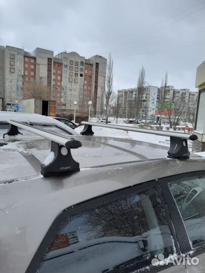 Багажник для автомобилей с Т-профилем (аэро дуга)