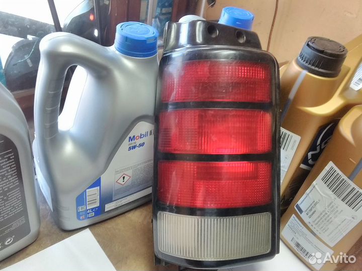 Крайслер вояджер 1992-оптика фонарь левый