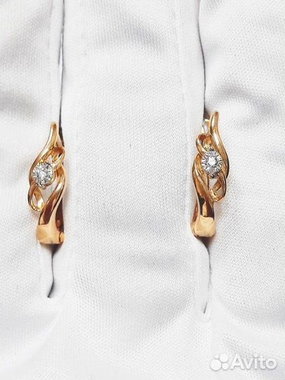 Золотые серьги с камнем