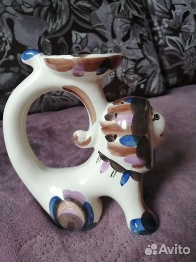 Подсвечник лев