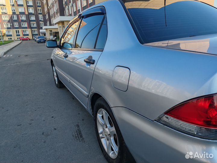 Mitsubishi Lancer 1.3 МТ, 2006, 210 000 км