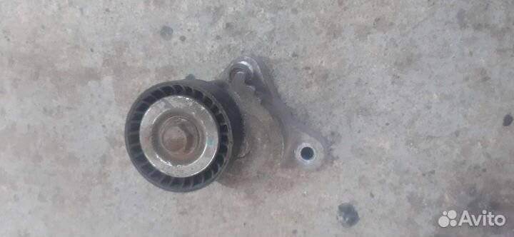 Натяжитель ремня mitsubishi lancer 10 X