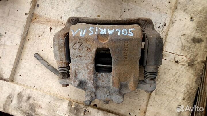 Суппорт тормозной передний Левый Хендай Солярис