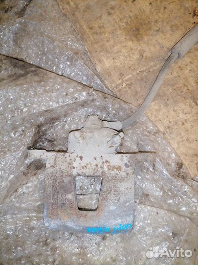 Суппорт тормозной передний левый Daewoo Nexia