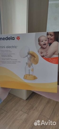 Молокоотсос medela