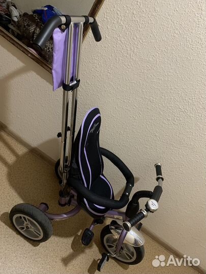 Трехколесный велосипед с ручкой