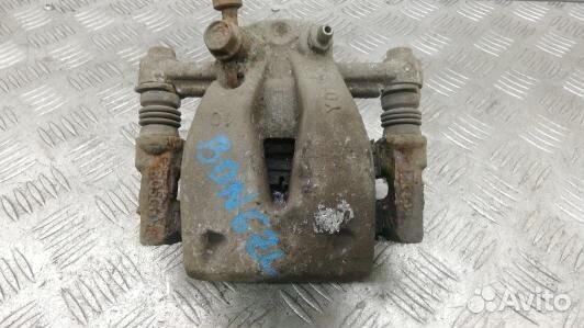 Суппорт тормозной задний левый toyota avensis T25