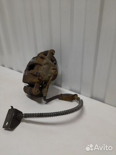 Суппорт тормозной передний правый Kia Rio QB 1.6