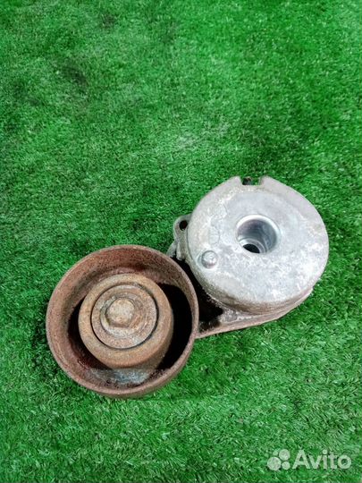 Натяжитель ремня Nissan Dualis / Qashqai KNJ10