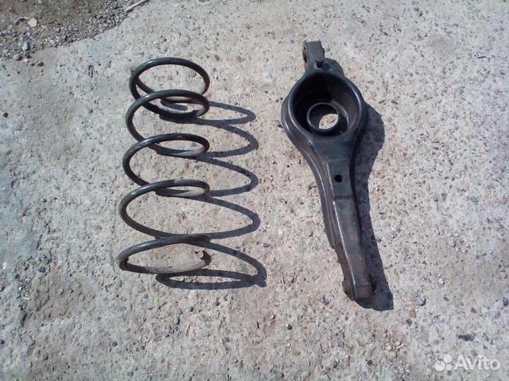 Задний рычаг с пружиной Ford Focus1