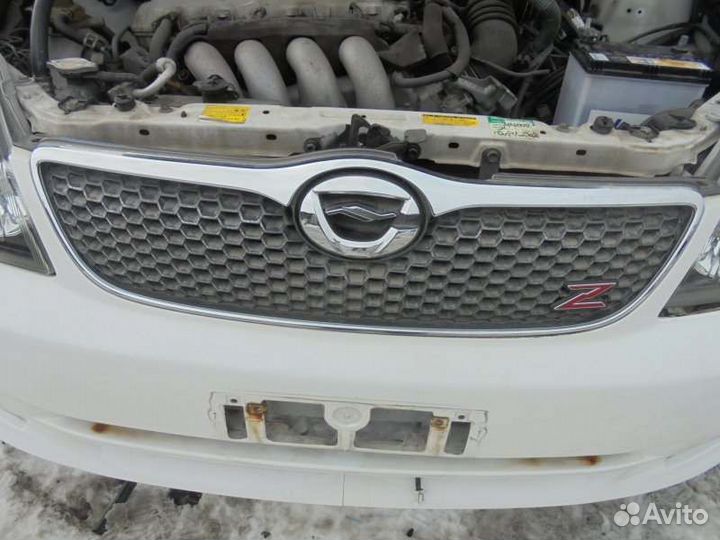 Решетка радиатора Toyota Corolla Fielder ZZE123