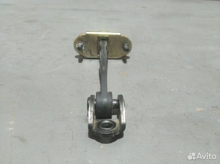 Ограничитель двери передний левый Ford Fusion