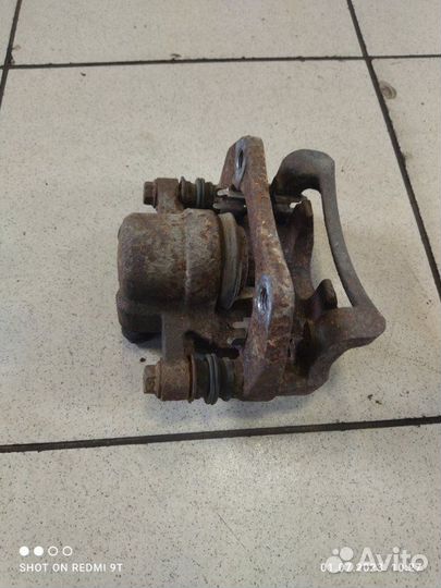 Суппорт тормозной задний левый Chery Tiggo 5 T21