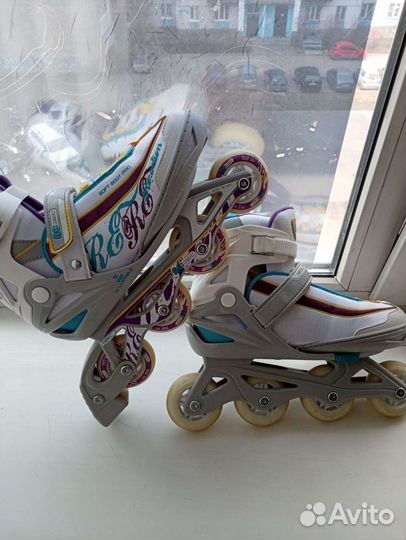 Роликовые коньки