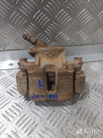 Суппорт передний левый Mitsubishi Pajero Junior