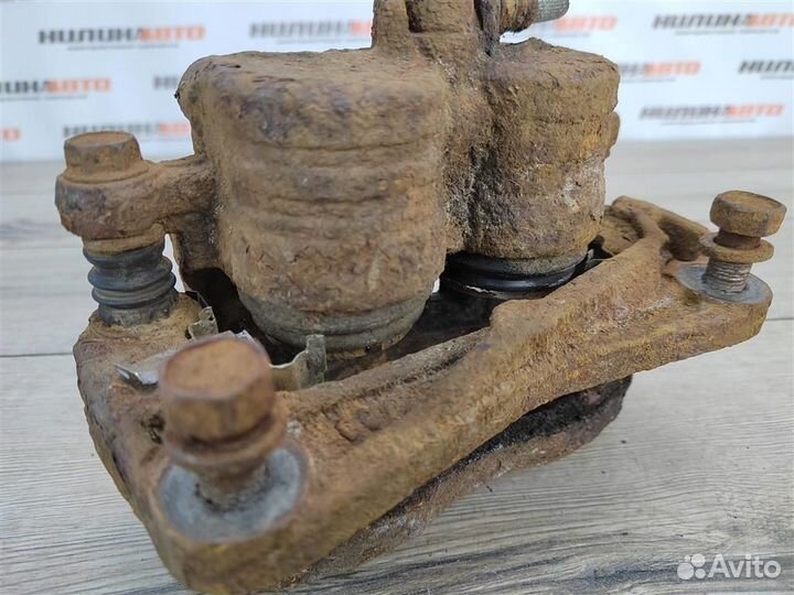 Суппорт передний левый subaru Forester 3 SH