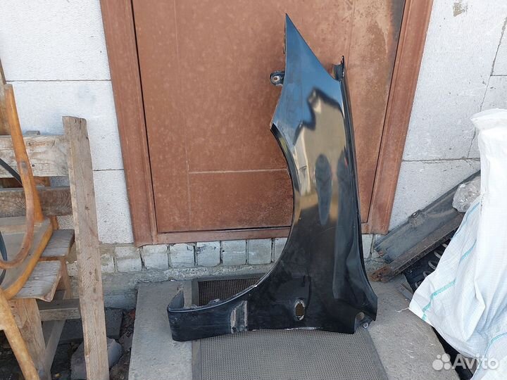 Митсубиси Лансер 9 крыло переднее левое MN150625