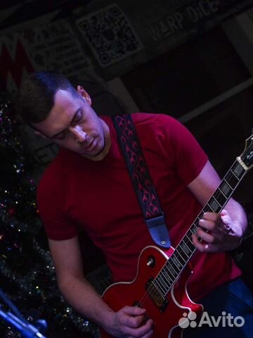Уроки игры на гитаре в студии на Западном