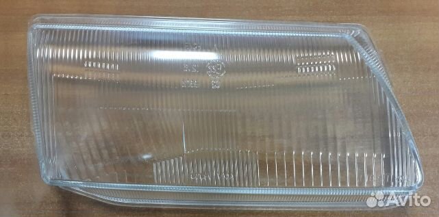 Стекло фары правое Opel Astra F