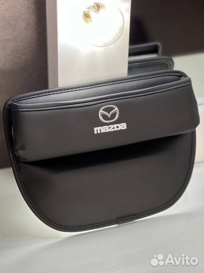 Органайзер между сидений mazda