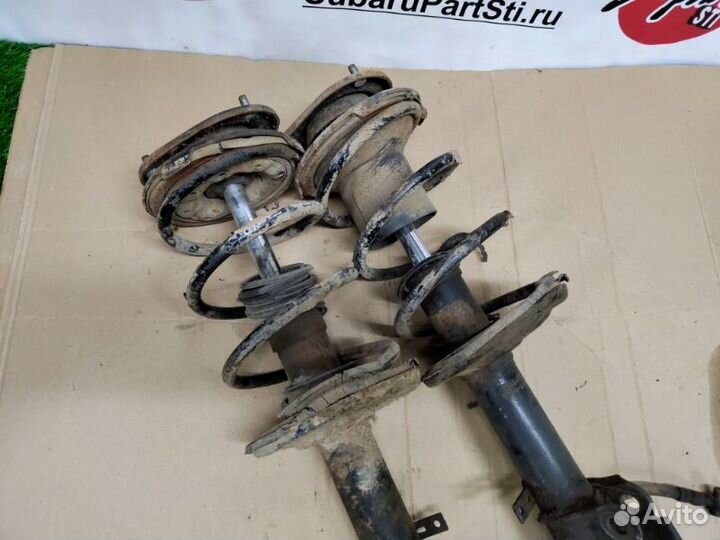 Стойки передние Toyota Corolla AE 100 5AFE 1992