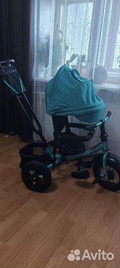 Трехколесный велосипед с ручкой