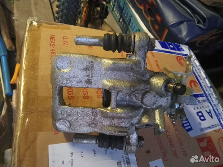 Суппорт задний левый nissan almera n16